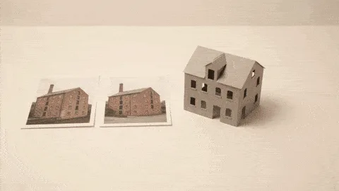Two photographs of a brick mill beside a small grey paper model of a building on a white table.