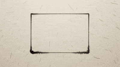 Three empty ink boxes inside a rectangle on warm paper, with short trails.